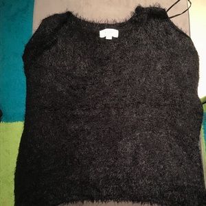 Cold shoulder fuzzy top